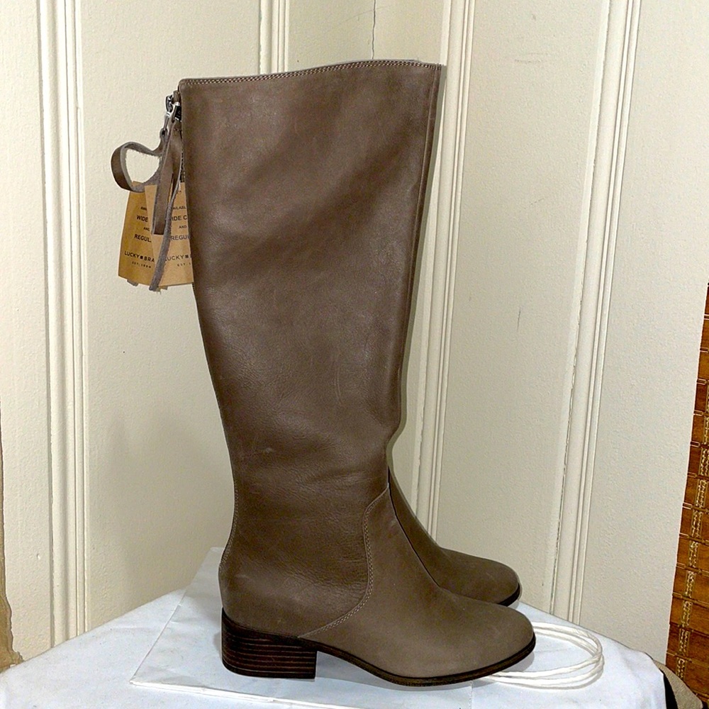 Lucky Brand riding boots in a grayish brown color. New with tags.  Size 8M
